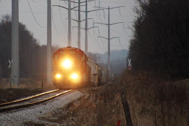 G64 crosses Bilkie Road near Poynette in the deepening dusk of one of the shortest days of the year