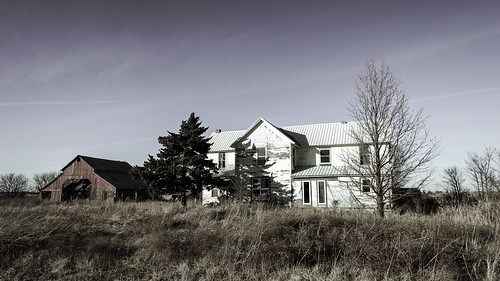 abandonedhouse shadows barn field peelingpaint deterioration faded baretrees neglect sky weathered
