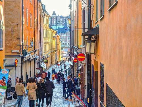 city town streets people buildings old öld cityscape architecture busy winter cold stockholm sweden street historic perspective gamlastan