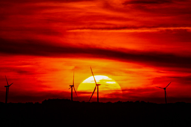 Sunset And Wind Turbines