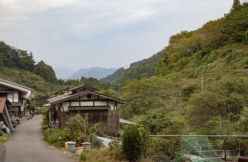 buildings pavement watermill wood shrines edoperiod japanesealps kiso valley kisovalley mountains busstation bus train trainstation clouds vacation sky hills greentea shops houses path brook trees waterfall teahouse trail nakasendotrail nagisso tsumago magome nagoya tokyo japan asia forest
