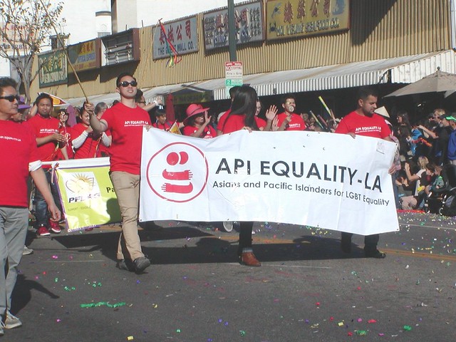 Asian Pacific Islanders Equality - Los Angeles for Lesbian and Gay Bisexual Transgender Equality 洛杉磯亞太島民平等與女同性戀和男同性戀雙性戀跨性別平等 walking and marching at Los Angeles Chinatown Golden Dragon Parade located at Ord Street, Alpine Street, College Street, Chinatown