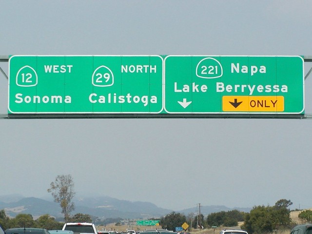 State Highway Junction Route CA-29 Northbound Napa - Vallejo Highway Napa - Calistoga and State Highway Junction Route CA-12 Carneros Highway WEST Sonoma two left lanes approaching 1/4 = 0.25 mile to Exit 12 - State Highway Junction Route CA-221 NORTH