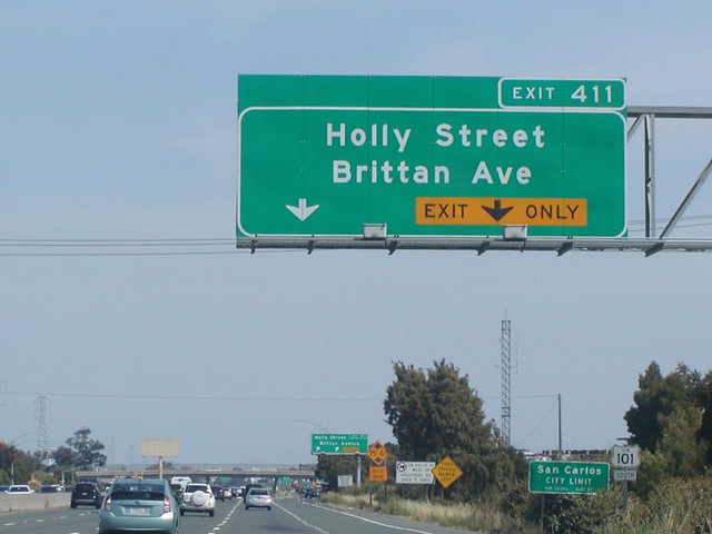 U.S. Highway Route 101 Southbound Bayshore Freeway approaching 1/4 = 0.25 mile to Exit 411 - Holly Street and Brittan Avenue on an auxiliary right lane EXIT ONLY out of two right lanes may exit ahead with this overhead sign located at