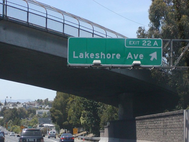 Interstate 580 Westbound General Douglas MacArthur Freeway approaches at Exit 22A - Lakeshore Avenue (Exit Ramp 35 MPH) followed by Exit 21B - Grand Avenue Next Right Exit 1/3 = 0.33 Mile Ahead, Exit 21A - Harrison Street and MacArthur Boulevard