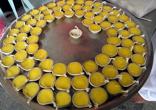 Butter candles in the bright Hindu temple in Singapore