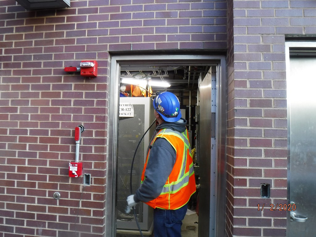 Installing fiber optic cables. | MTA Construction & Development Mega ...
