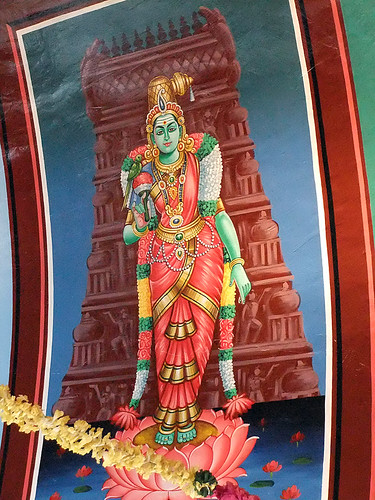 Poster in the bright Hindu temple in Singapore