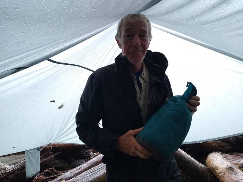 It's great packing up in the rain - if you're dry and standing under a large nylon tarp!