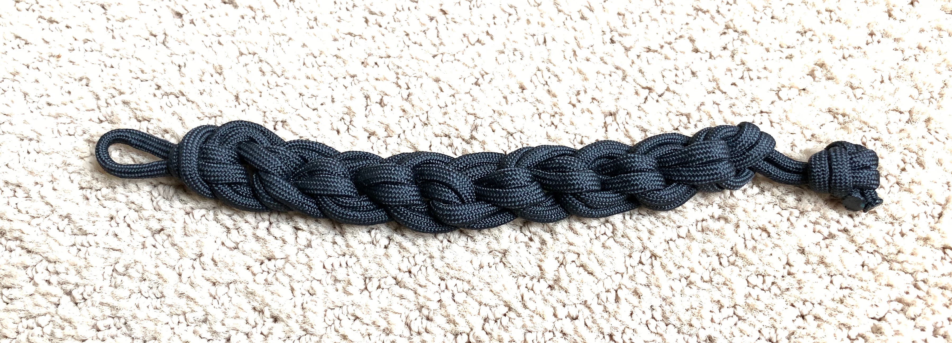 the Chive *Authentic* Paracord Bracelet expands to 7 feet 