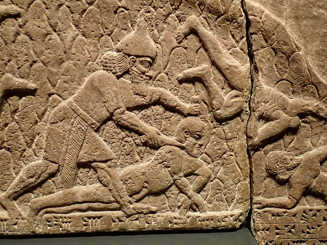 Assyrian relief of an attack on an enemy town from Kalhu (Nimrud) reign of Tiglath-pileser III 730-727 BCE (2)