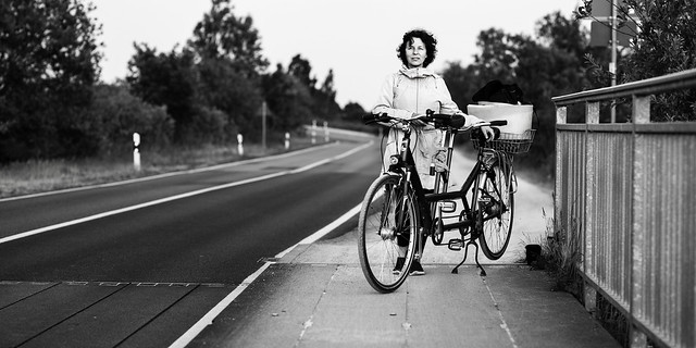 Tandem on Bridge with single rider,  life style portrait