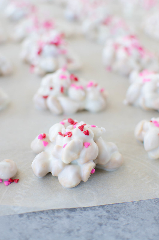 White Chocolate Crockpot Candy - easy 4 ingredient white chocolate peanut clusters! Made completely in the slow cooker. Perfect for holidays! 