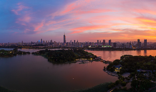 Beautiful Sunset Glow over Nanjing City after Sunset by asusmt, nanjing jiangsu peoplesrepublicofchina aerial drone landscape lake landmark architecture building to