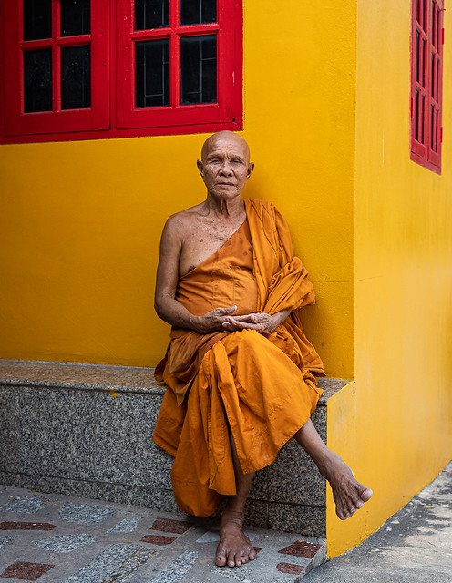 Monk Against Yellow Wall, Wat Sangkat Rattana Khiri, Uthai Thani