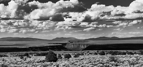 newmexico taos riograndegorge river troutfishing scenicview clouds weather mesa unitedstates
