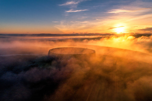 grianan aileach lough swilly foyle ancient irish kings hill lookout fort sunrise misty mist fog fogy dew cloudy clouds ring ringed burt county donegal ireland summer landmark stone monument tourist site famous visit scenic countryside druid celtic gareth wray photography inishowen derry londonderry an angrainan sun inch island historic aerial drone dji phantom p4p pro quadcopter heather national gaelic photographer garethwrayphotography vacation holiday europe sunset kingdom architecture landscape 4 sky graianan