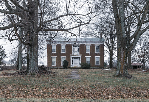 house dwelling residence historic farmhouse fivebay centralpassage twostory brick flemishbond greekrevival cornicereturns entablature 66windows stone lintels sills trabeateddoorway sidelights transom pilasters trees chimneys abandoned vacant 1840s nicholascounty kentucky millersburg