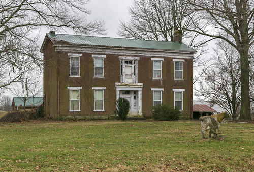 house dwelling residence historic farmhouse fivebay centralpassage twostory brick flemishbond greekrevival cornicereturns entablature 66windows stone lintels sills trabeateddoorway sidelights transom pilasters trees chimneys abandoned vacant 1840s nicholascounty kentucky millersburg