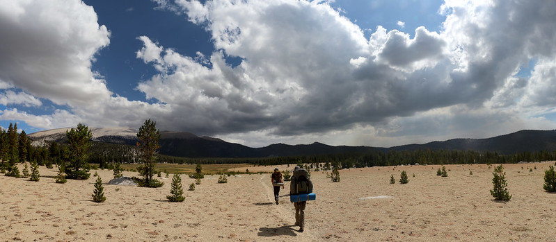 Panorama view of Big Whitney Meadow with Cirque Peak on the left and plenty of cumulus clouds