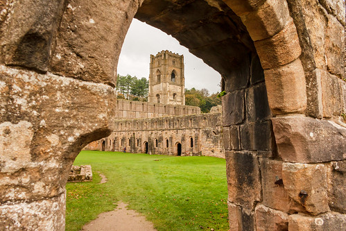 fountainsabbey abbey church monastery tower ruins building architecture ancient unesco gradeilisted ripon yorkshire england cistercian infirmary doorway arch landscape