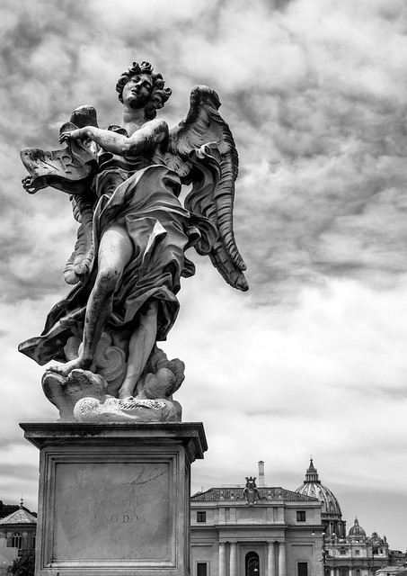 View of statue on a bridge across the River Tiber, Rome, Italy