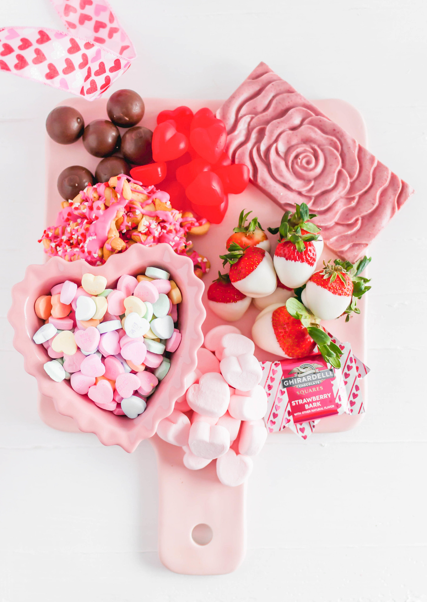 This Valentine's Dessert Board is simple and delicious to put together. A few simple homemade treats filled in with adorable store-bought options.
