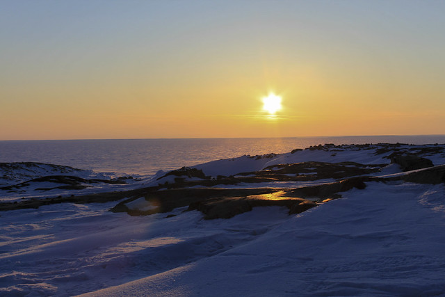 Beautiful sunset over an arctic landscape near Whale Cove, Nunavut.