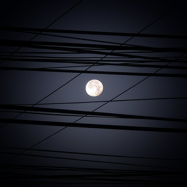 MOON IN BETWEEN CABLES