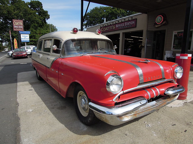 Here's something you don't get to see every day. A 1955 Pontiac Star Chief ambulance pulls up for service at a local garage. Hey bub, fill 'er up with ethyl!  Pearl River, New York. Aug 2016.