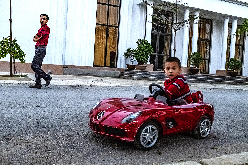 Boy in toy car--Dien Bien Phu