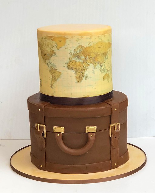 World map suitcase cake