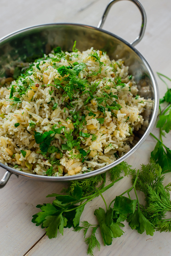 15 minutes for the most flavorful side dish. Lemon rice pilaf is cooked with orzo and toasted pine nuts, pistachios and loads of fresh herbs.
