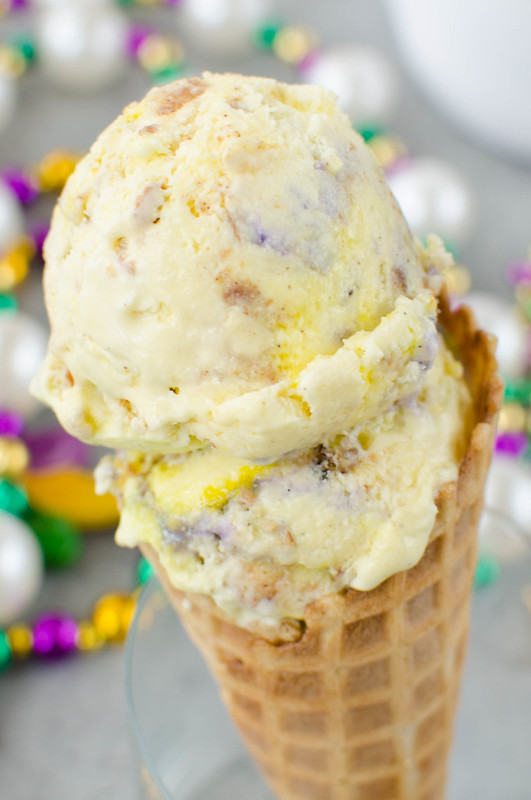 King Cake Ice Cream - it's Mardi Gras, y'all! Cream cheese ice cream with king cake pieces and sprinkles mixed in. 