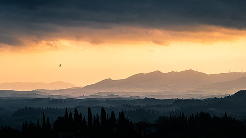 photo landscape sunset nature italy outdoor hills orange clouds trees tuscany travel bird yellow sky valley photography europe geotagged mountain peccioli provinceofpisa onsale