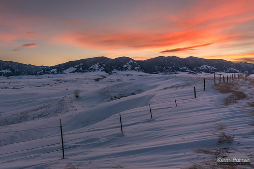 sheridan bighornmountains beckton wyoming winter february cold snow snowy evening sunset sky nikond750 tamron2470mmf28 fence drift blowing windy color colorful orange red pink clouds grass cornice