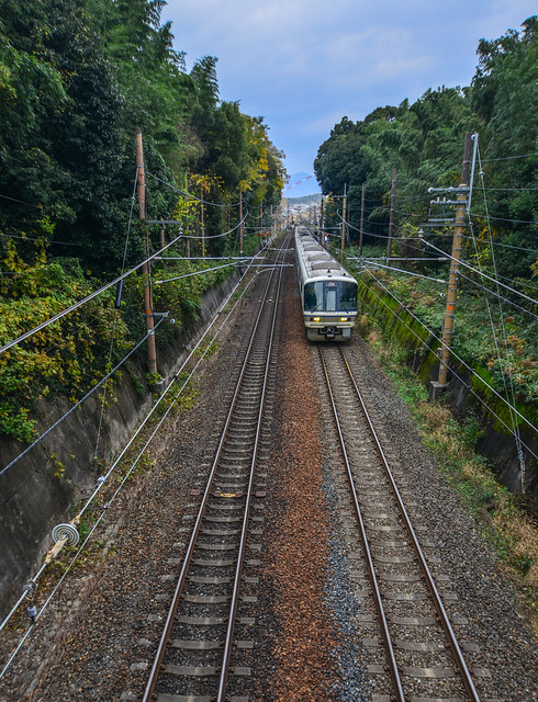 A train on rail track in Kyoto, Japan