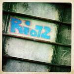 Rio72 chalk graffiti tag on concrete 