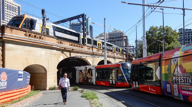 Sydney Light Rail -  LRVs 2205 & 2206 meet a Waratah Mk 2 - B 15 - at Eddy Avenue and Elizabeth Street