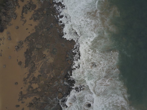 beach rain sand water waves ocean sea birds eye view drone dji mavic pro overcast