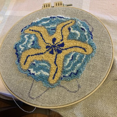A rug hooking WIP designed on the fly by Karen K using Lettlopi!
