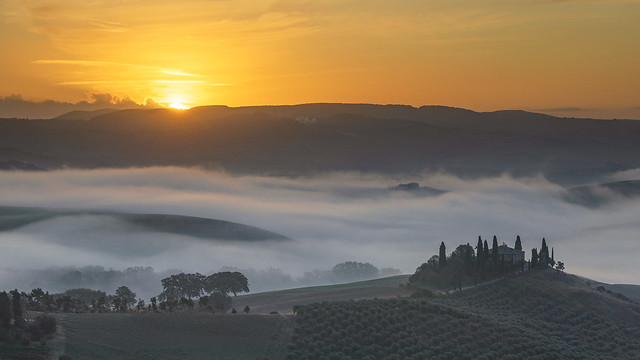 Sunrise Over the Podere Belvedere in the Autumn Mist, Tuscany, Italy