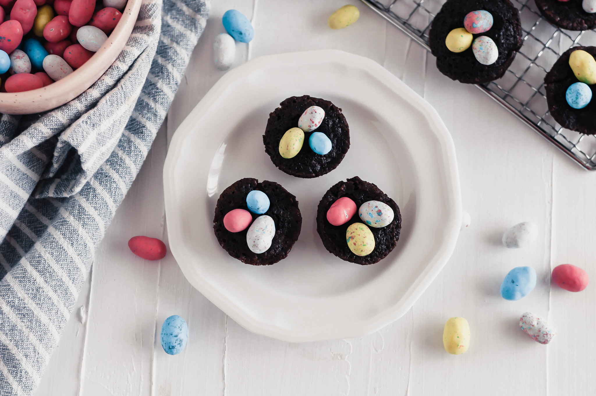 These cute little Brownie Nests are SO simple to make and super festive. Get the kids in the kitchen to help make this simple Easter dessert.