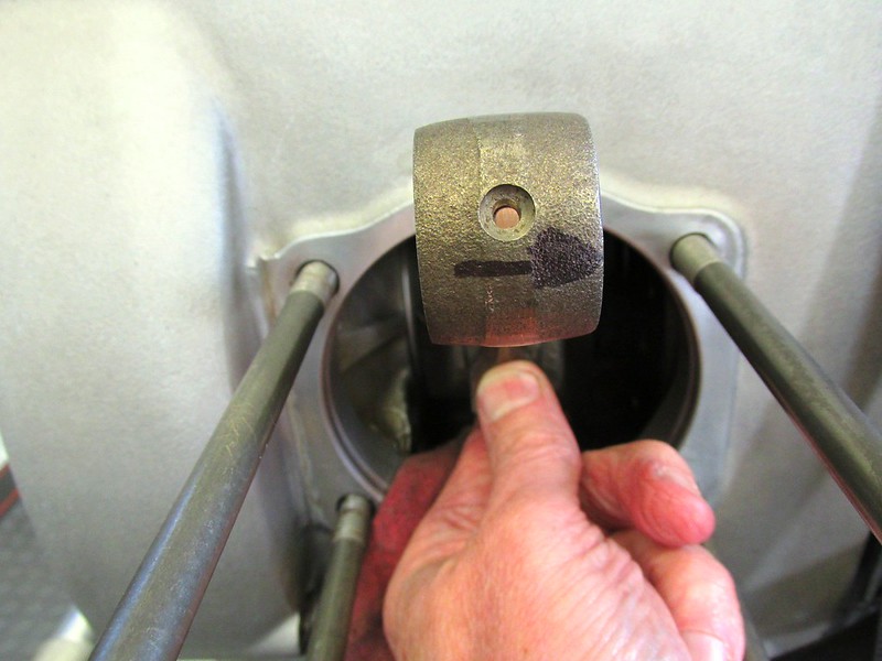Right Side Rod Installed On Rod End Cap In Correct Orientation-Arrow Toward Front of Engine