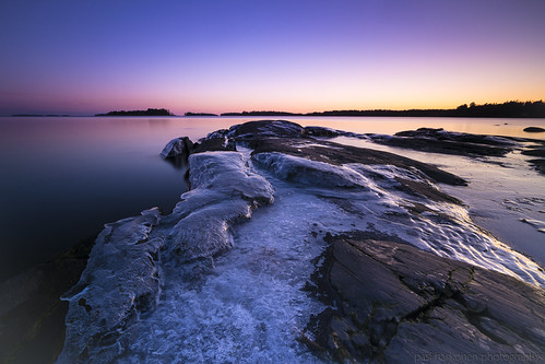 Natural Icy Art by pasiharkonen photography, This icy cliff and the afterglow of the sunset have been captured in Nuottaniemi, Helsinki in the en