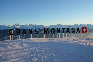 Crans Montana logo in the sunset