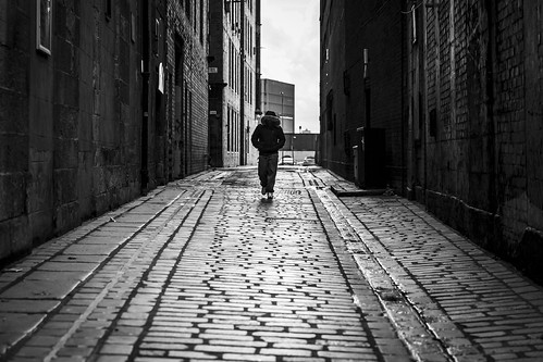 urban street candid streetphotography candidstreetphotography streetlife sociallandscape urbanlandscape man male walking shape form silhouette hood fur cold winter weather alley alleyway backstreet lines perspective gait cobbles cobblestones walls urbancanyon tone texture detail depth naturallight outdoor light shade city scene human life living humanity society culture lifestyle people canon canon5dmkiii 70mm ef2470mmf28liiusm black white blackwhite bw mono blackandwhite monochrome glasgow scotland uk leanneboulton