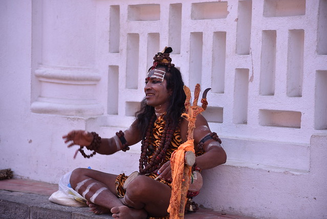 A riff raff dressed up like the Hindu god Shiva outside Pashupatinath temple