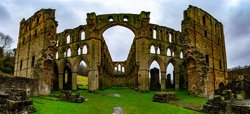 cistercian monastry catholic religeon religeous reformation henry eigth ruin remains elegany simple gothic north yorkshire yorks moors english heritage member membership visit tourism holiday green rain rainy winter spring cloudy sky dark colourful saturated bright contrast panorama stitched stitch wide angle fish eye landscape