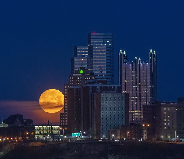 Setting Moon creeping behind the Pittsburgh Skyline